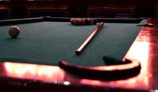 Professional pool table setup in Framingham content img2